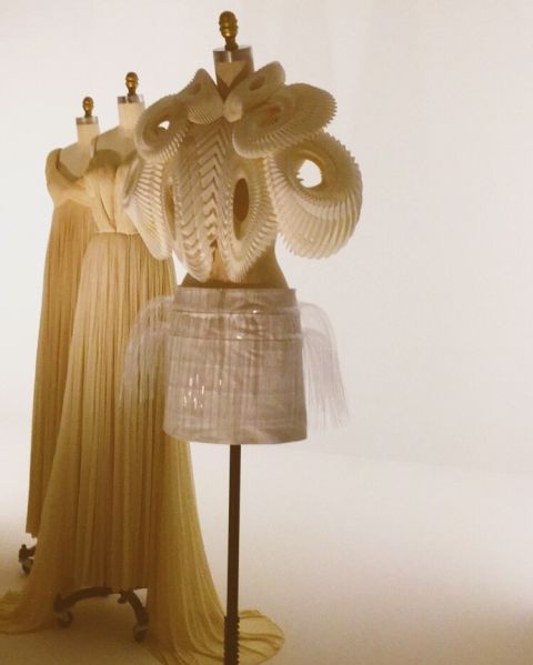 Three dresses at Manus x Machina at the Met.