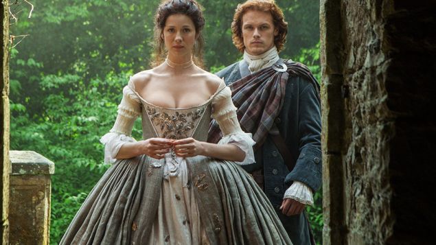 Caitriona Balfe as Claire Randall and Sam Heughan as Jamie Fraser on Outlander.