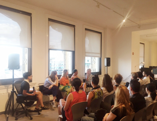 JIaJia Fei and the panelists discuss social media at last Tuesday's panel.