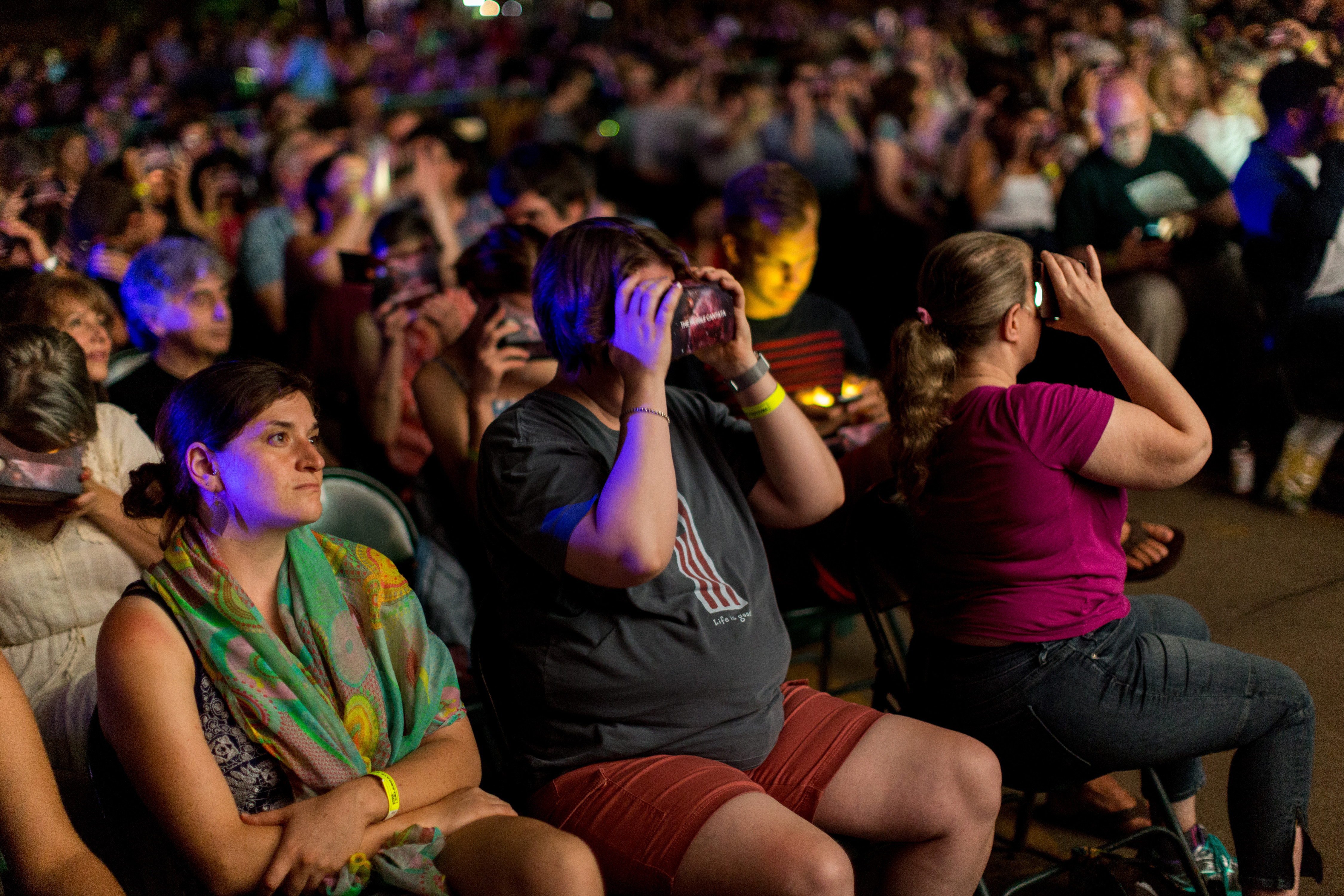 Patrons use their VR headsets on a jounrye to The Orion Nebula in "The Hubble Cantata" premiered in Brooklyn on Aug 6th, 2016 