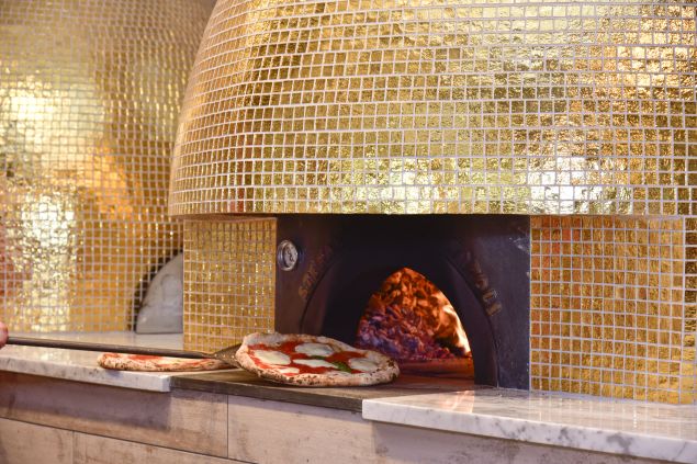 One of the three wood-burning ovens at the new Eataly.