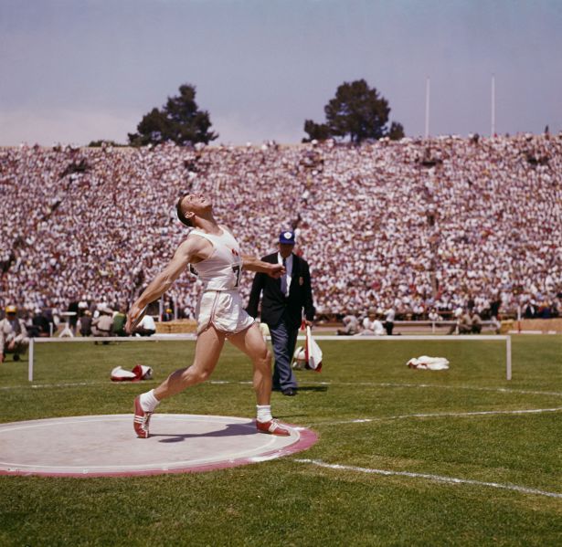 American athlete Al Oerter (1937 - 2007) competes in the discus throw, circa 1965