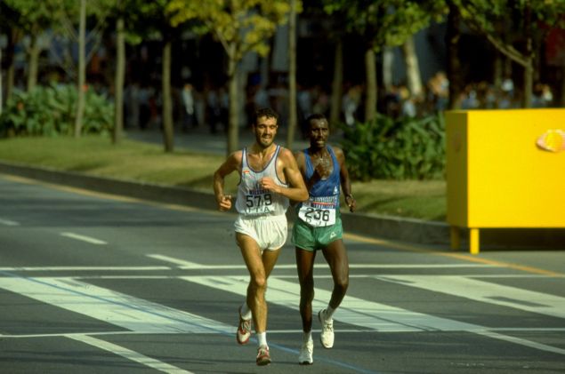 2 Oct 1988: Gelindo Bordin of Italy (left) and Ahmed Saleh of Djibouti in action during the Mens Marathon event of the 1988 Olympic Games in Seoul, South Korea. Bordin won the gold medal and Saleh the bronze.
