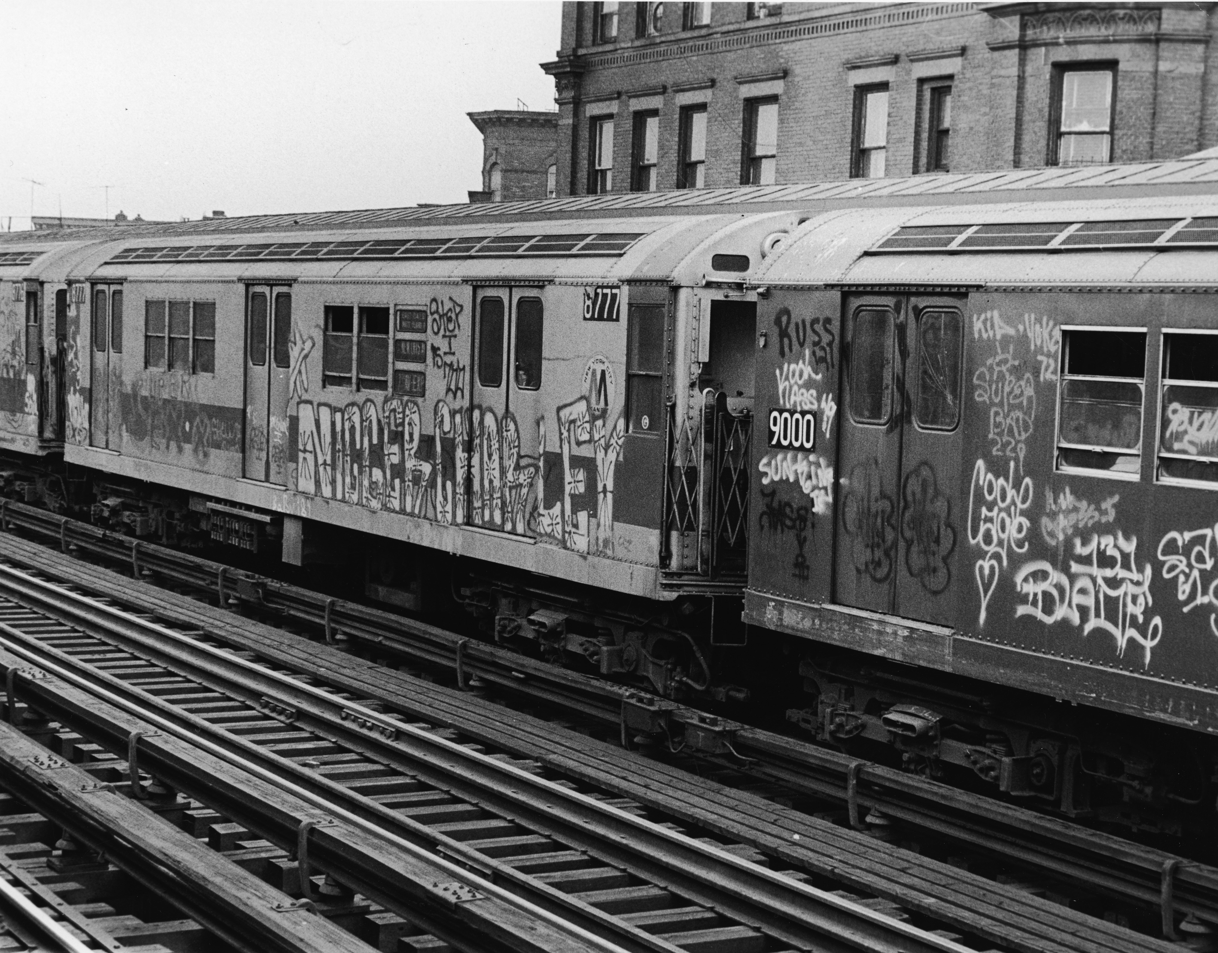 Exterior of subway cars painted with graffiti in the 1970s.