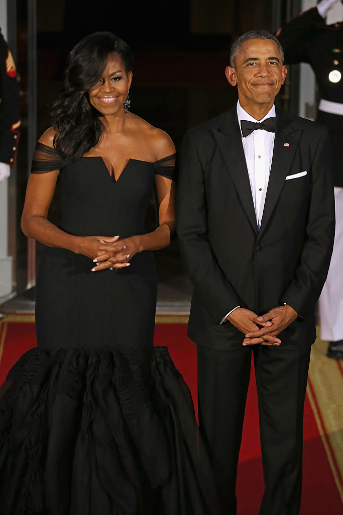Michelle Obama has been credited with making the of-the-shoulder dress popular. 