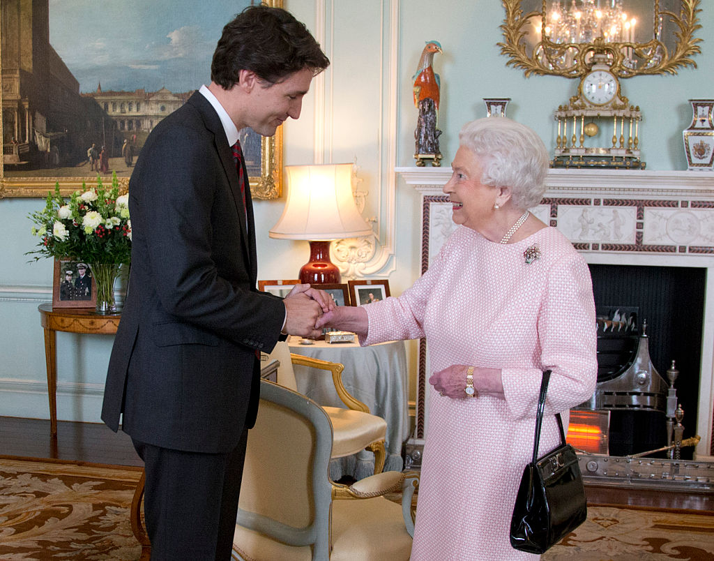 TPrime Minister of Canada Justin Trudeau shake hands with Queen Elizabeth II during a private audience at Buckingham Palace on November 25, 2015 in London, England. This is the first visit of Trudeau in Britain since his election as Canadas Prime Minister.