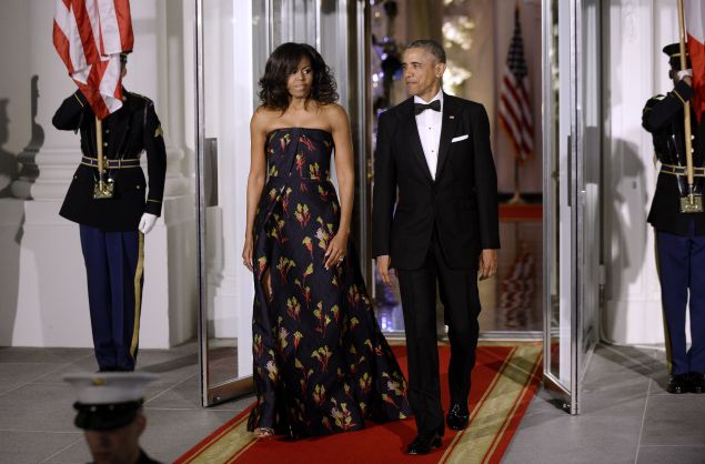 First Lady Michelle Obama and President Barack Obama arrive to welcome Canadian Prime Minister Trudeau and First Lady Sophie Trudeau of Canada at the North Portico of the White House on March 10, 2016 in Washington, D.C.