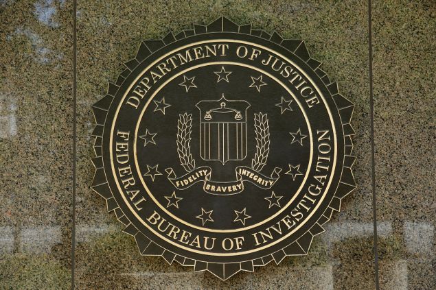 The FBI logo is seen outside the headquarters building in Washington, DC on July 5, 2016. 