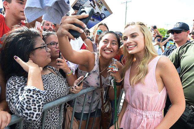 I'm not going to include a still of Margot Robbie's ass from the film, so here's a nice pic of her taking a selfie with a fan!