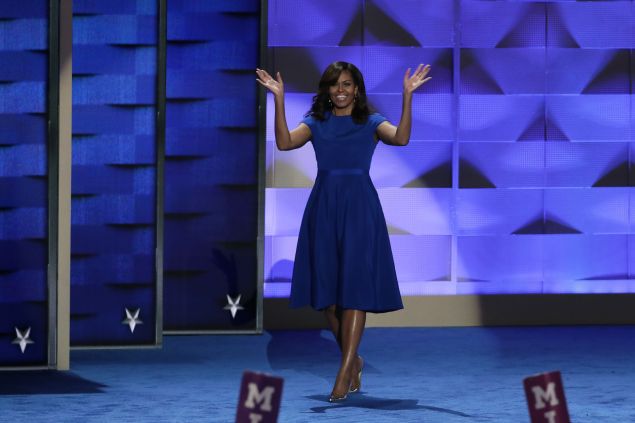 First lady Michelle Obama walks on stage to deliver remarks on the first day of the Democratic National Convention at the Wells Fargo Center, July 25, 2016 in Philadelphia, Pennsylvania.
