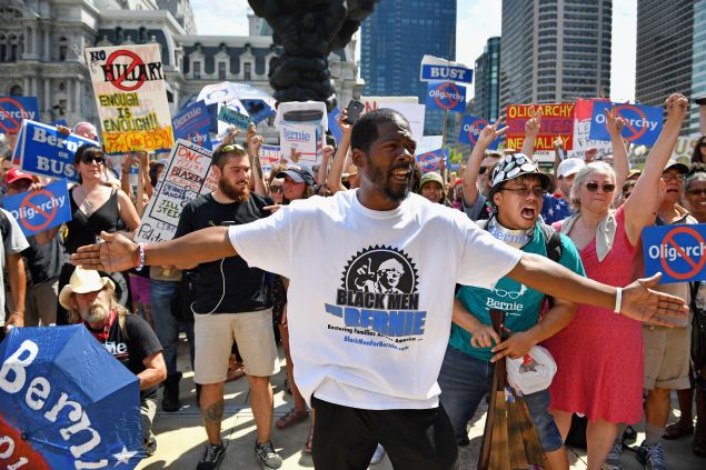 Bernie Sanders supporters gather near City Hall on day three of the Democratic National Convention (DNC)