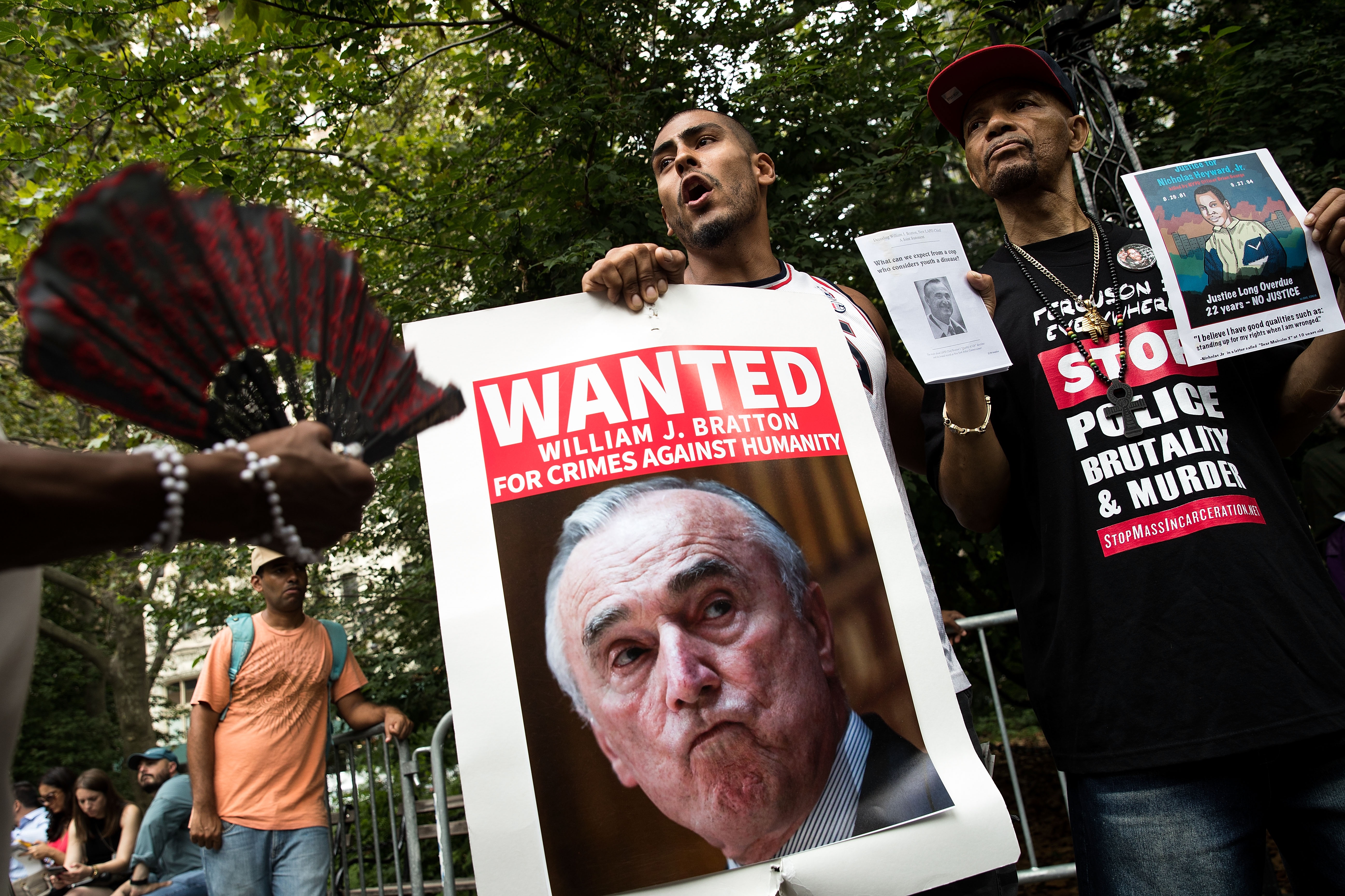 Protesters attack Bratton in City Hall Park last week.