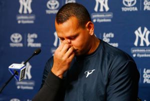 Alex Rodriguez tears up at a press conference yesterday. Rodriguez is set to play his last game in pinstripes on Friday.