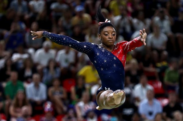 Simone Biles midair