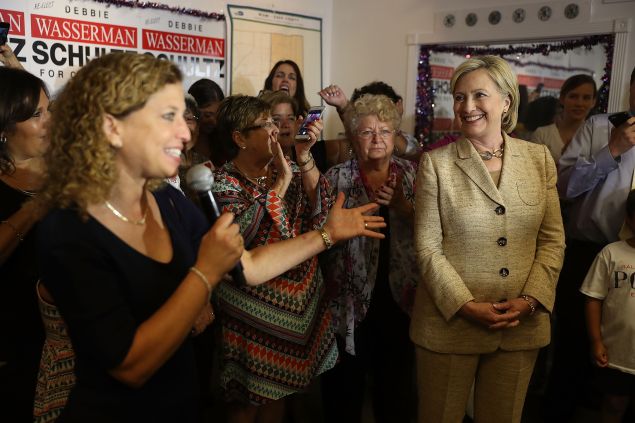 Debbie Wasserman Schultz (D-FL) introduces Democratic presidential nominee Hillary Clinton as she stops by her campaign headquarters on August 9, 2016 in Davie, Florida. Hillary continues to campaign to become the next President of the United States.