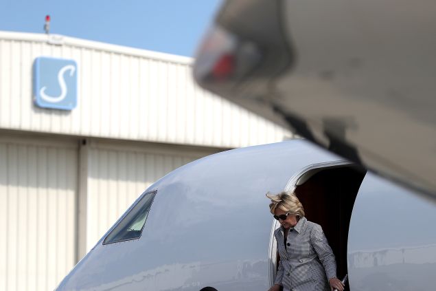 Democratic presidential nominee former Secretary of State Hillary Clinton walks off of her plane at Van Nuys Airport on August 22, 2016 in Van Nuys, California. Hillary Clinton is attending fundraisers in California. 