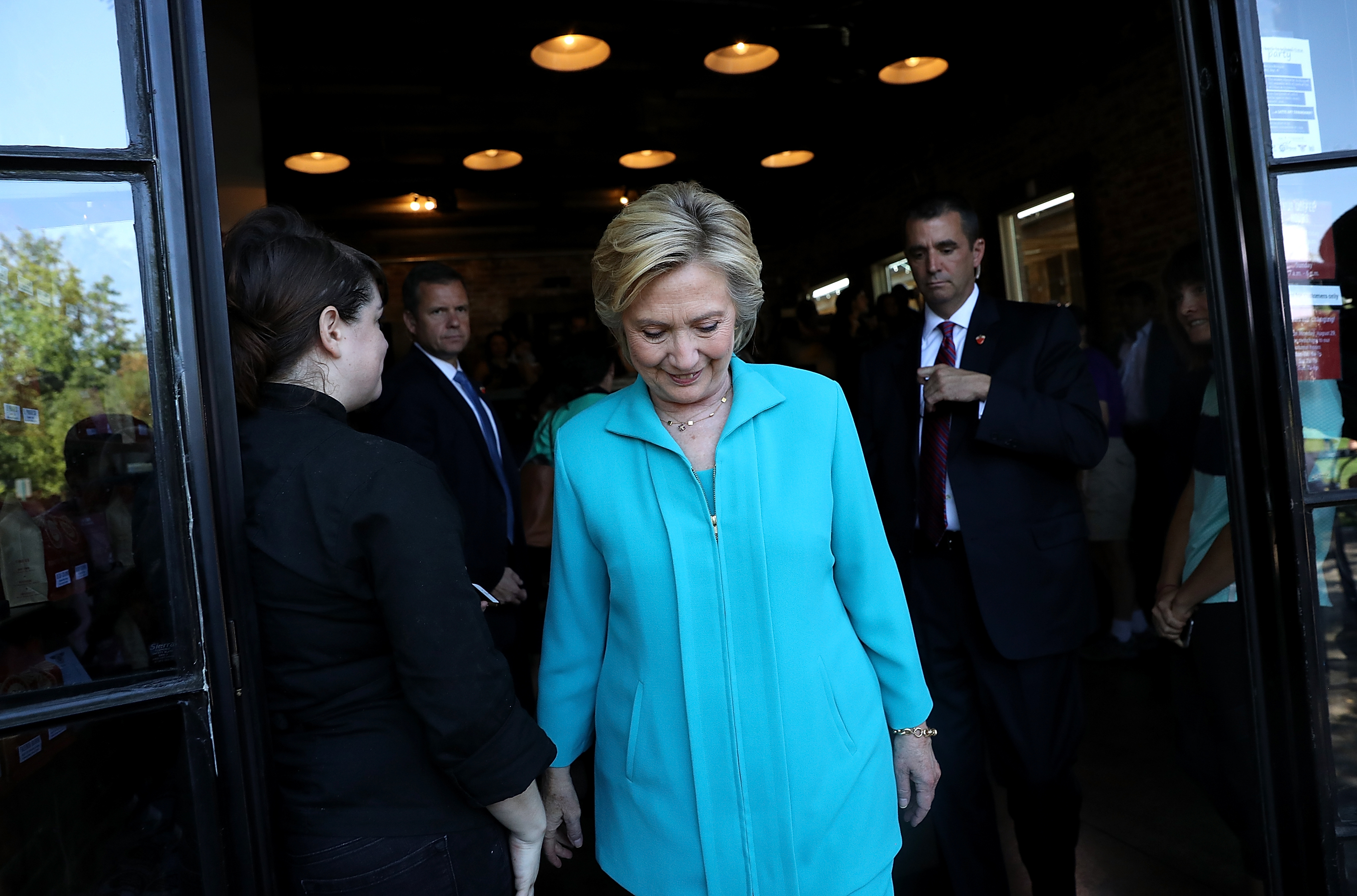 Clinton supporters tend to see the economy glass as half full.