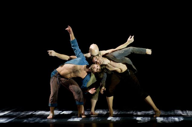 L.A. Dance Project dancers Aaron Carr, Charlie Hodges, and Morgan Lugo in Harbor Me by Siddi Larbi Cherkaoui.