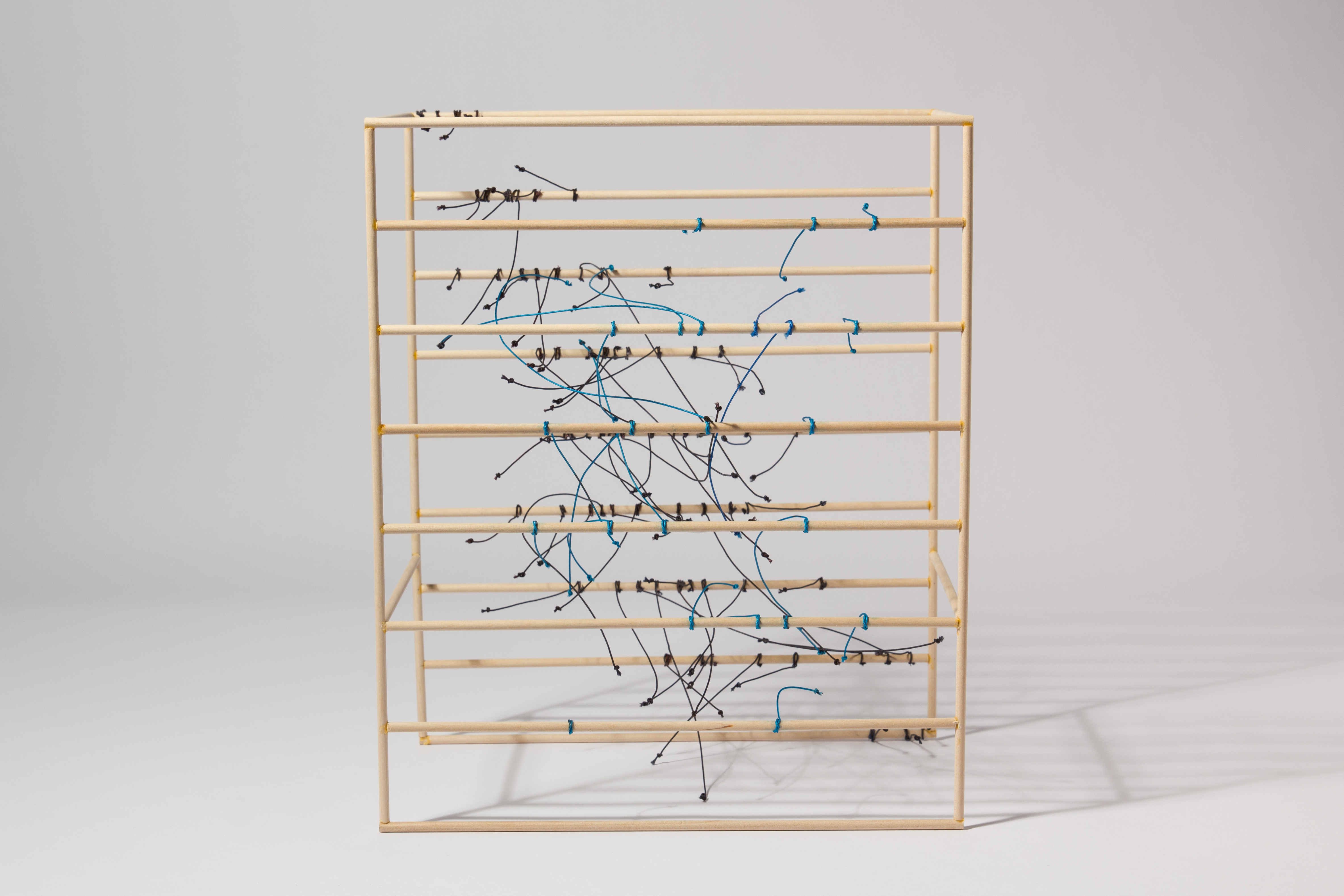 Richard Ibghy & Marilou Lemmens, Average Years of Schooling and Income Gini Coefficient, 2016, Wood and string, 11 × 13 × 63/4 in. (27.94 × 33.02 × 17.14 cm).