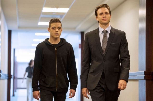 Rami Malek as Elliot Alderson and Martin Wallstrom as Tyrell Wellick
