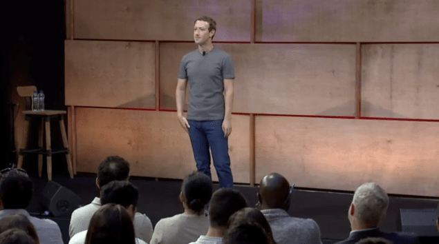 Zuck taking questions from the audience and video comments.