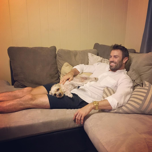 The Bachelorette's Chad Johnson with his dog. 