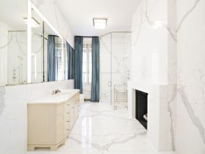 The fireplace in the bathroom is crucial.