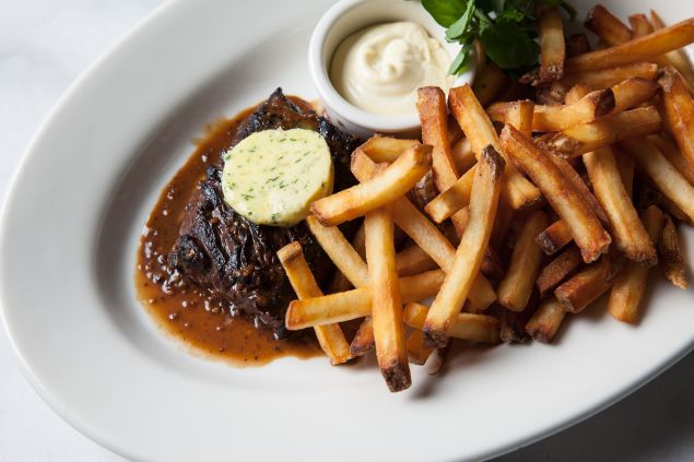 The Creekstone Farms steak frites at Cassia comes with a Phú Quốc island peppercorn sauce.