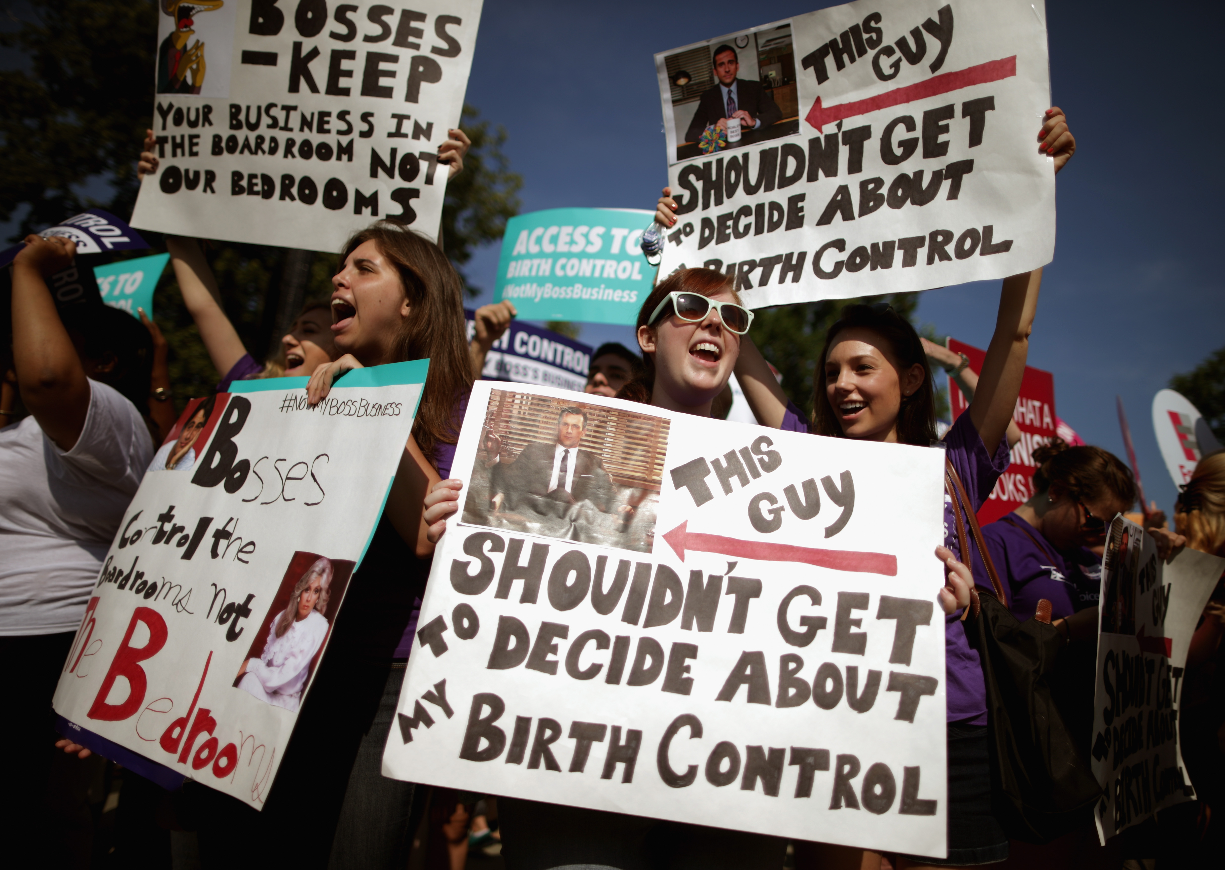 Demonstrators chant after the Hobby Lobby ruling outside the U.S. Supreme Court in Washington June 30, 2014.