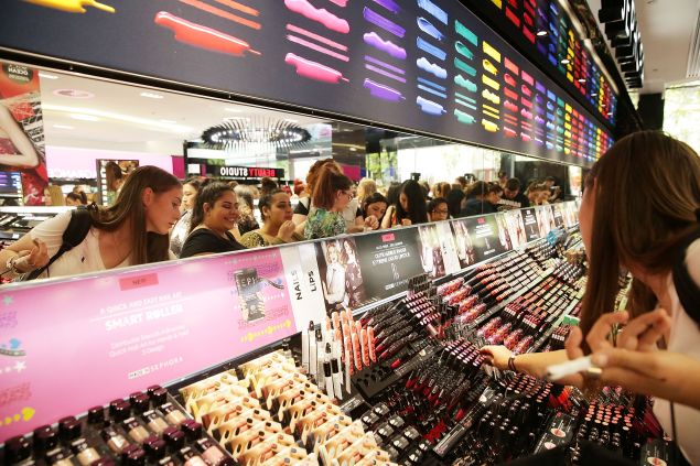 Shoppers attend the opening of Sydney's first Sephora store at Westfield Pitt Street Mall on December 5, 2014 in Sydney, Australia. This is the first Sephora store to open in Australia. 