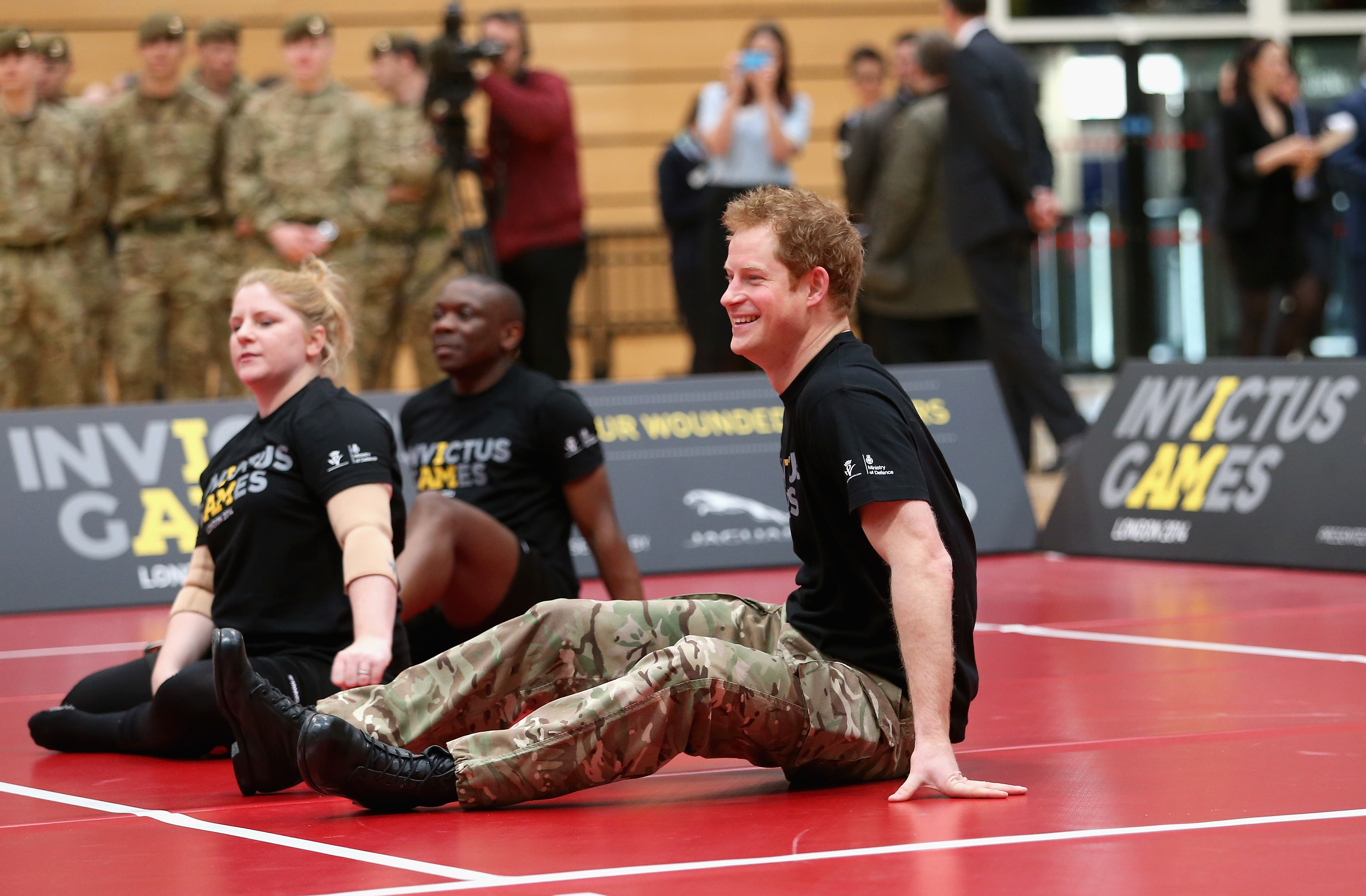 Prince Harry plays sitting volleyball as he takes part in a match at the media launch for the Invictus Games 2014 at the Copper Box Arena in the Olympic Park on March 6, 2014 in London, England. The Invictus Games for wounded, injured and sick serivce personnel will use the power of sport to inspire recovery, support rehabilitation and generate a wider understanding of those who serve the country. Prince Harry has brought the Games to the UK following a trip to see the Warrior Games in Colorado in 2013. 300 competitors from around the world will take part from the 10th-14th September.