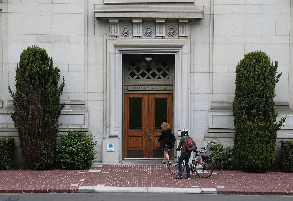 BERKELEY, CA - MAY 22: People enter California Hall on the UC Berkeley campus on May 22, 2014 in Berkeley, California. According to the Academic Ranking of World Universities by China's Shanghai Jiao Tong University, Stanford University ranked second behind Harvard University as the top universities in the world. UC Berkeley ranked third.