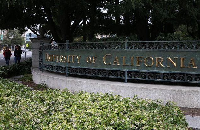 BERKELEY, CA - MAY 22: Pedestrians walk by an entrance to the UC Berkeley campus on May 22, 2014 in Berkeley, California. According to the Academic Ranking of World Universities by China's Shanghai Jiao Tong University, Stanford University ranked second behind Harvard University as the top universities in the world. UC Berkeley ranked third.