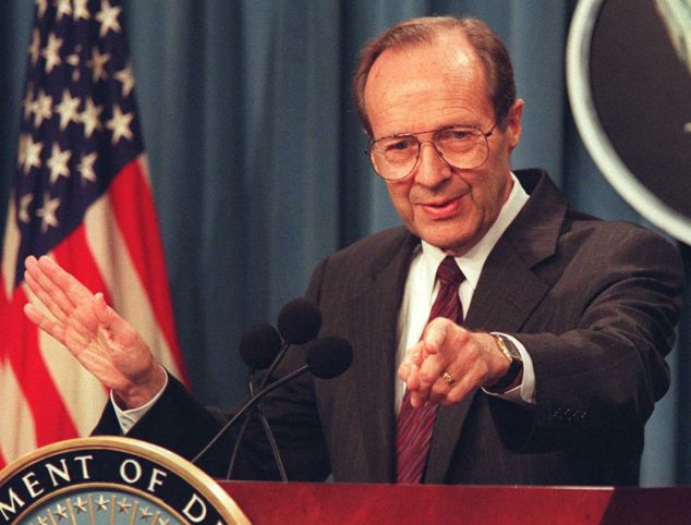 US Defense Secretary William Perry points to a reporter during a press conference at the Pentagon
