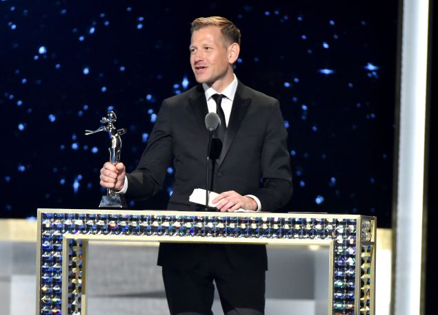 Andrew accepting his 2016 CFDA Award