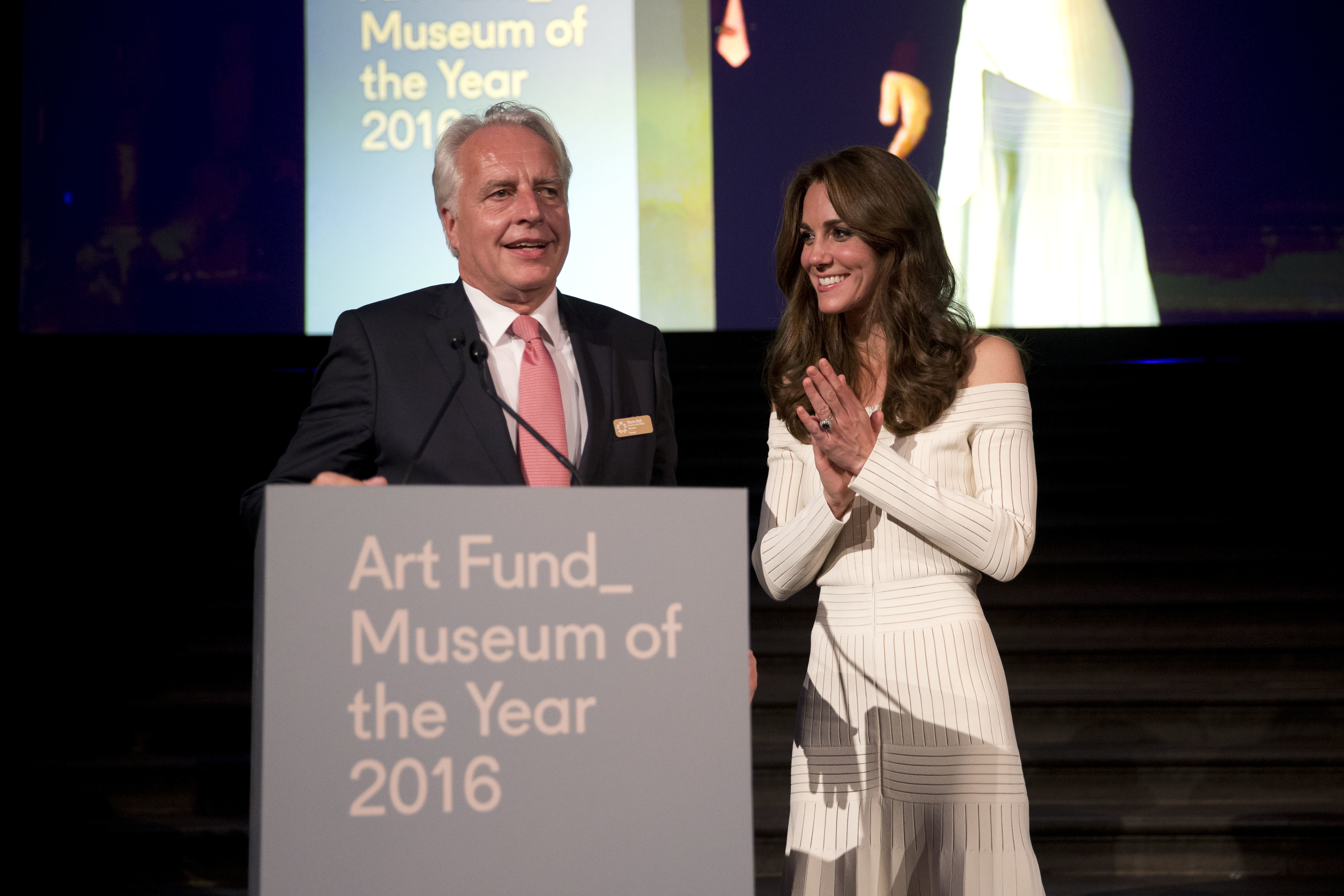 LONDON, ENGLAND - JULY 07: Catherine, Duchess of Cambridge applauds Germany's Martin Roth the Director of the Victoria and Albert Museum as he speaks on stage in his capacity as the representative of the winner of the Art Fund Museum of the Year 2016 prize at the Natural History Museum on July 6, 2016 in London, United Kingdom. The Art Fund Museum of the Year prize is awarded annually to one outstanding museum which has shown exceptional imagination, innovation and achievement in the preceding year.