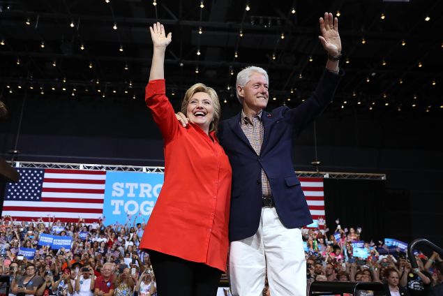 PITTSBURGH, PA - JULY 30: Democratic presidential nominee former Secretary of State Hillary Clinton and her husband former U.S. president Bill Clinton greet supporters during a campaign rally with democratic vice presidential nominee U.S. Sen Tim Kaine (D-VA) at the David L. Lawrence Convention Center on July 30, 2016 in Pittsburgh