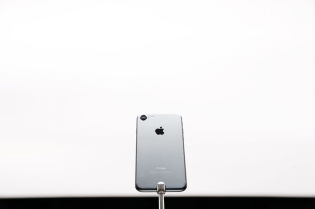 An Apple iPhone 7 is seen during a launch event on September 7, 2016 in San Francisco, California. Apple Inc. unveiled the latest iterations of its smart phone, the iPhone 7 and 7 Plus, the Apple Watch Series 2, as well as AirPods, the tech giant's first wireless headphones.