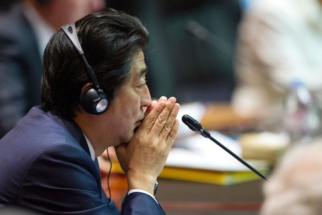 Japan's Prime Minister Shinzo Abe attends the 11th East Asia Summit in Vientiane on September 8, 2016 ASEAN leaders gather in Vientiane for the 28th and 29th ASEAN Summits held between September 6 to 8.