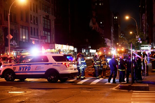 Police officers and firefighters respond to an explosion on September 17, 2016 in the Chelsea neighborhood of New York City. 