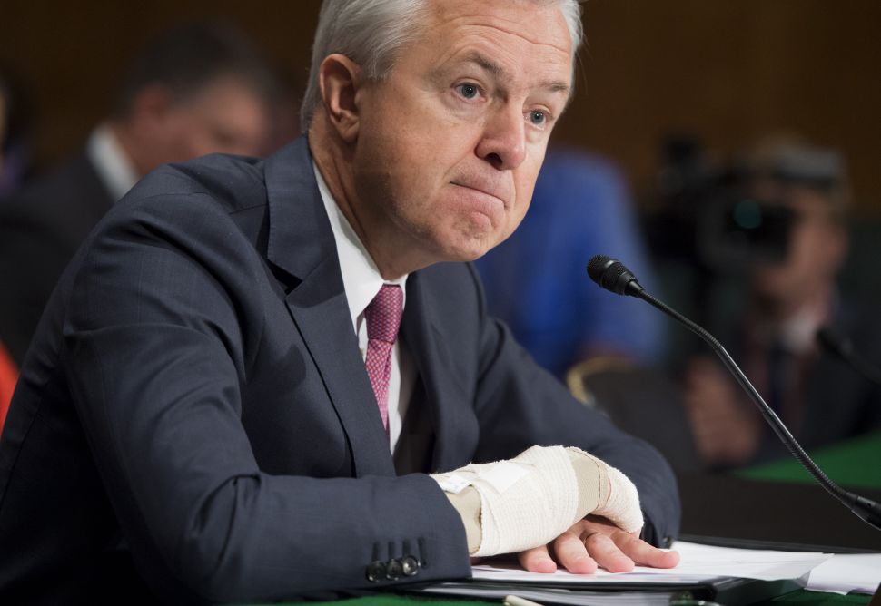 John Stumpf, chairman and CEO of Wells Fargo, testifies about the unauthorized opening of accounts by Wells Fargo during a Senate Banking, Housing and Urban Affairs Committee hearing on Capitol Hill in Washington, DC, September 20, 2016