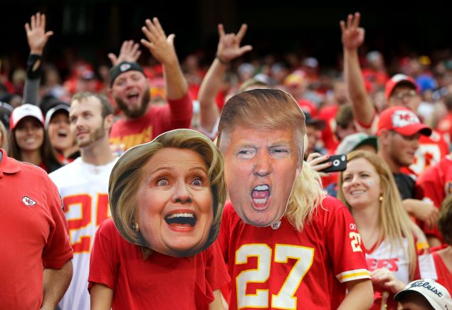 Kansas City Chiefs fans wear Hillary Clinton and Donald Trump masks during the game between the Chiefs and the New York Jets at Arrowhead Stadium on September 25, 2016 in Kansas City, Missouri. 