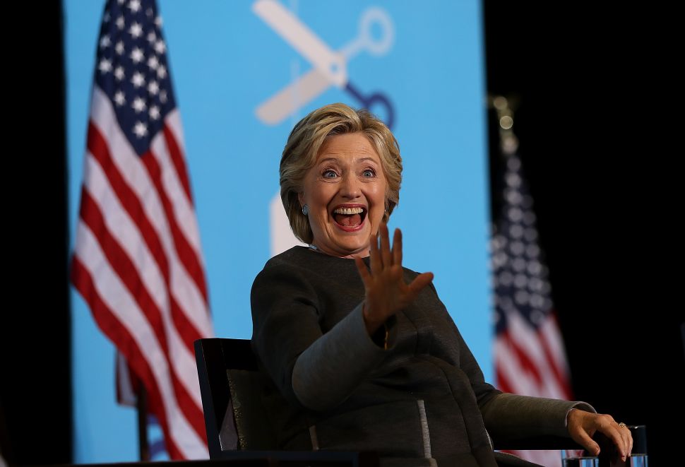 Democratic presidential nominee former Secretary of State Hillary Clinton greets supporters during a campaign rally with U.S. Sen. Bernie Sanders (I-VT) at University of New Hampshire on September 28, 2016 in Durham, New Hampshire