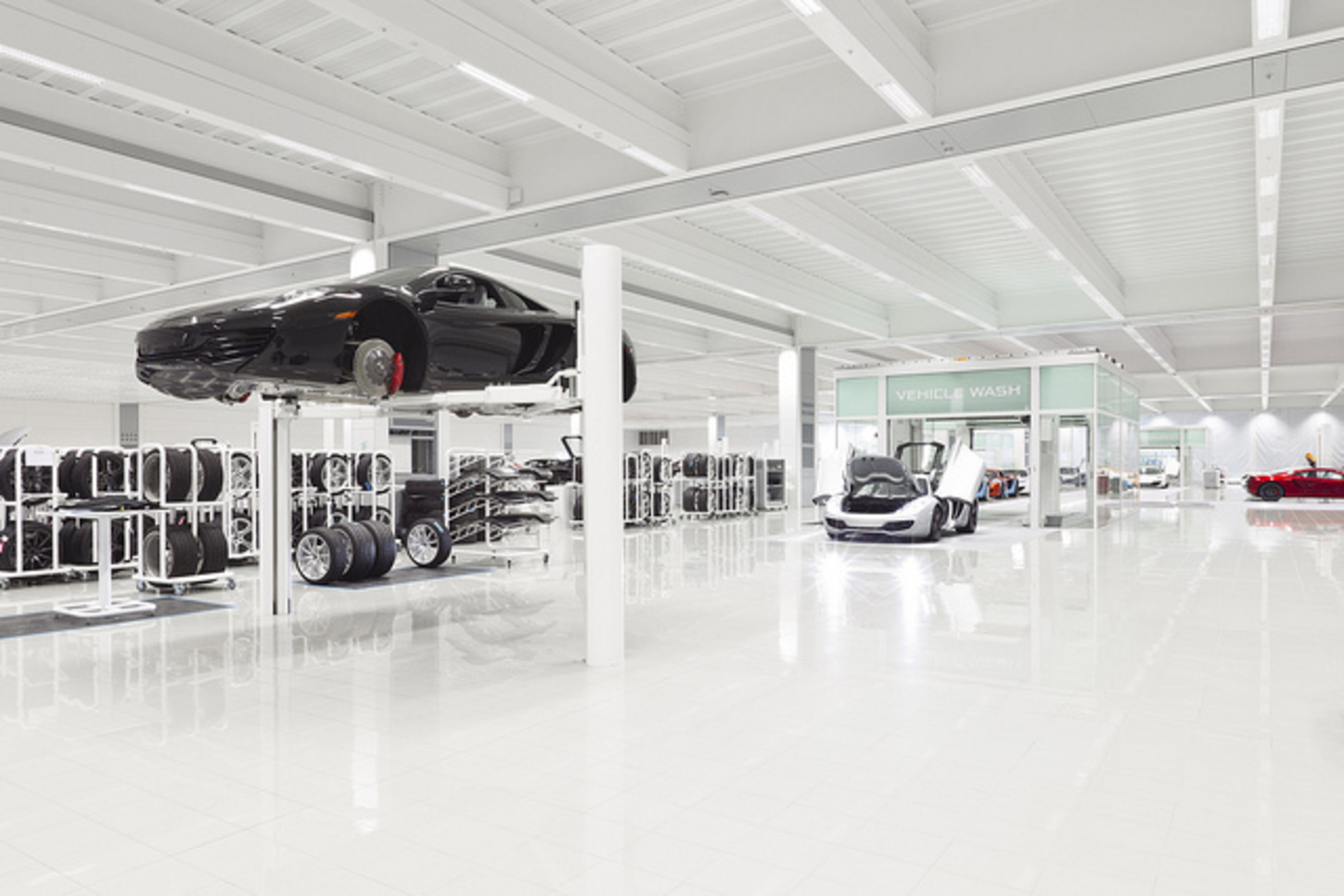 McLaren has clear aesthetic links with Apple. Inside the the Woking production centre.