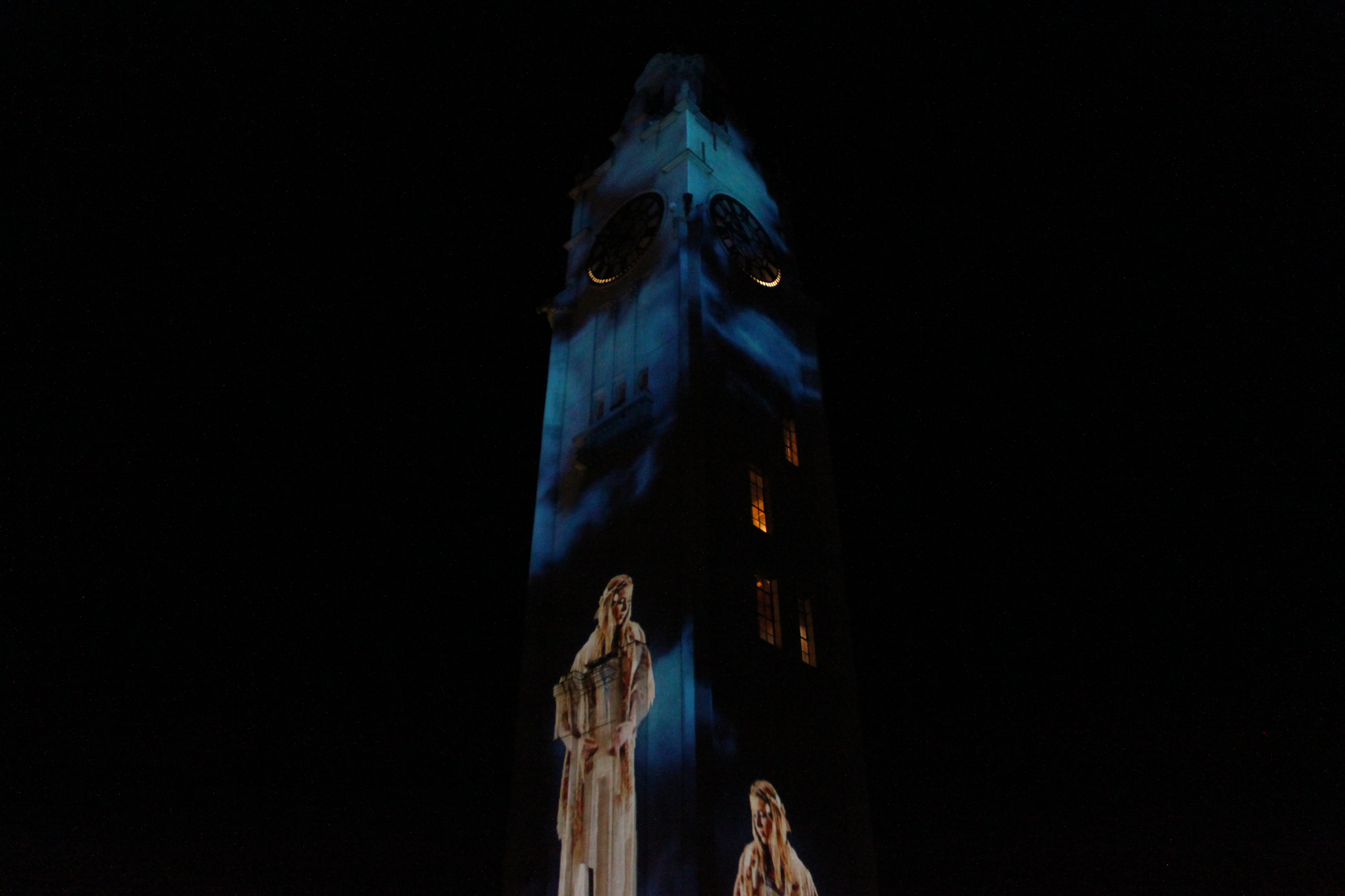 "Suzanne" projected on the clock tower at Montreal's old port.