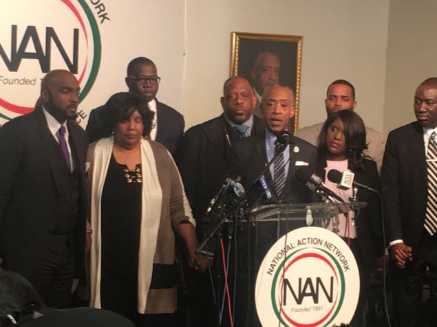Rev. Al Sharpton with the Crutcher family.