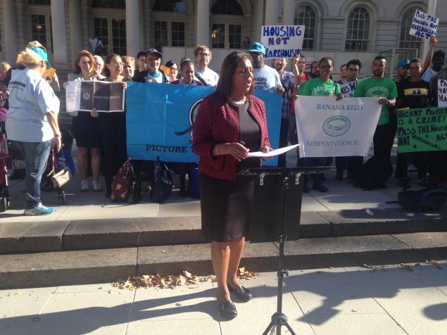 Public Advocate Letitia James speaking at a press conference blasting the number of vacant properties in the city.