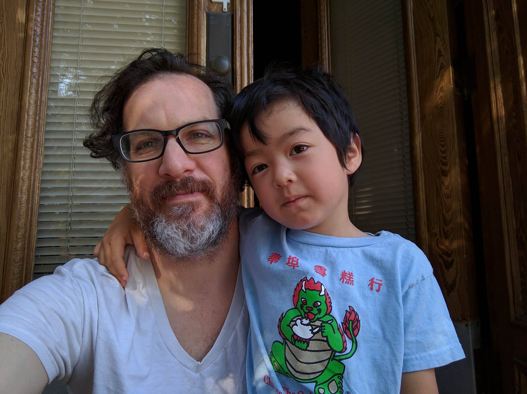 Todd with his young son