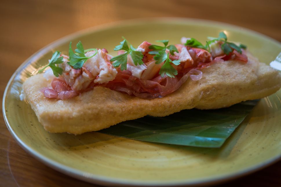 Yes, that's a $12 lobster roll on fried pizza dough at the Four Seasons hotel in Beverly Hills.