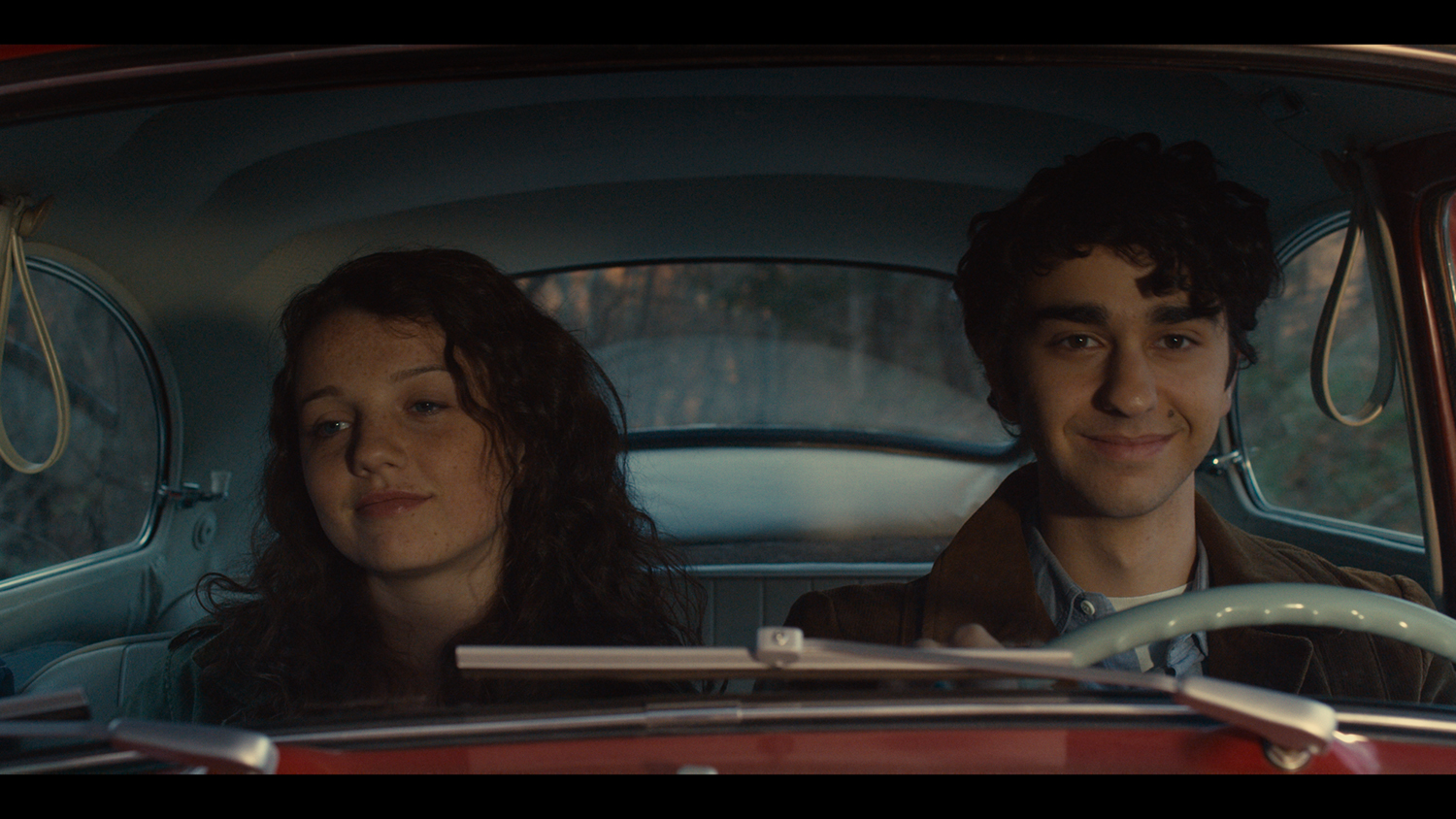 Alex Wolff and Stefania Owen.